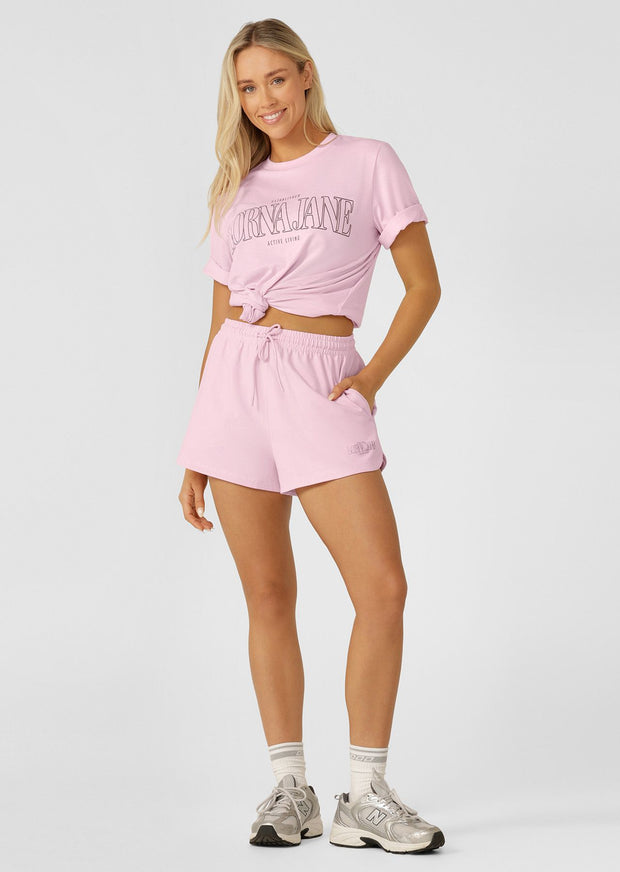 Level up your weekend style with the Lorna Jane Weekender Relaxed T-shirt. Featuring a bold sporty logo print on lightweight and breathable cotton blend fabric, this tee is the perfect addition to your active and weekend wardrobe. Style it with the matching sport shorts for the perfect summer look.