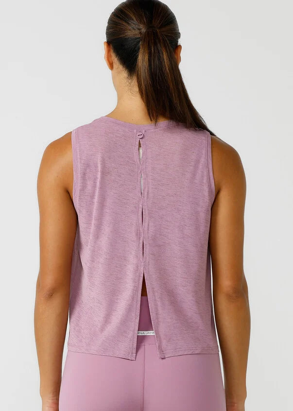 Go faster in this light-as-air active tank. Designed for everything from low to max intensity workouts, this mid length tank features split seams at the back for added ventilation and unrestricted movement during your workouts.