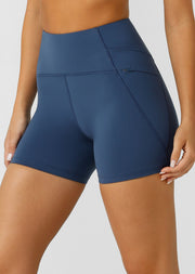 Engineered with Active Core Stability™ for built-in core compression, these 12cm inseam bike shorts provide optimal support and shaping. We've removed the inside leg seam for friction-free movement and added comfort. Stash your essentials in the secure side zip pocket and dominate your next workout session