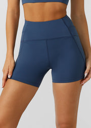 Engineered with Active Core Stability™ for built-in core compression, these 12cm inseam bike shorts provide optimal support and shaping. We've removed the inside leg seam for friction-free movement and added comfort. Stash your essentials in the secure side zip pocket and dominate your next workout session