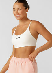 Meet your new must-have bra! Engineered for all day support, this sports bra features a soft brushed elastic underbust band and full strap adjustability to customise your fit. We know you'll love the streamlined silhouette with no underbust seam, the slimline bonded strappy back detail and soft fold edges for reduced dig.
