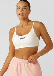 Meet your new must-have bra! Engineered for all day support, this sports bra features a soft brushed elastic underbust band and full strap adjustability to customise your fit. We know you'll love the streamlined silhouette with no underbust seam, the slimline bonded strappy back detail and soft fold edges for reduced dig.