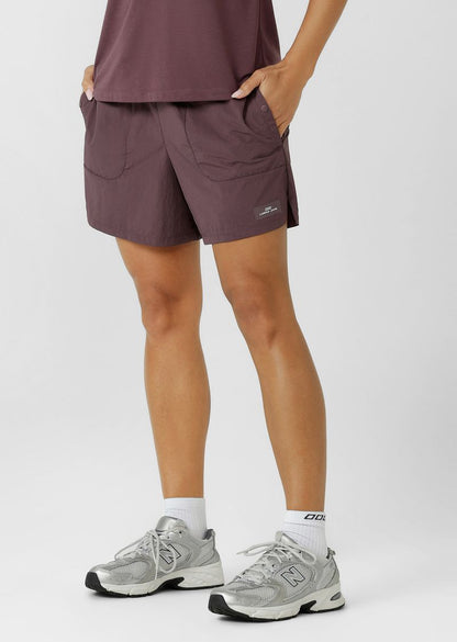 Mid Rise Longer Line Silhouette, 12.5cm Inseam
Water Repellent Taslon Active Fabrication
Notched Side Seams for Unrestricted Movement
Elasticated Waistband with Drawcord Adjustability
3 Pocket Design to Stash your Essentials- 2x Press Stud Side Pockets with Second Zip Pocket Layer