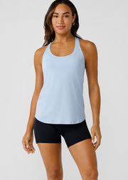 Upgrade your activewear collection with the Agility Mesh Active Tank. This sleek racerback tank is made from a lightweight semi-opaque mesh fabric, designed to offer full coverage with all the breathability of mesh. In a relaxed fit, long line silhouette, this tank looks great worn relaxed or knotted for a cropped look