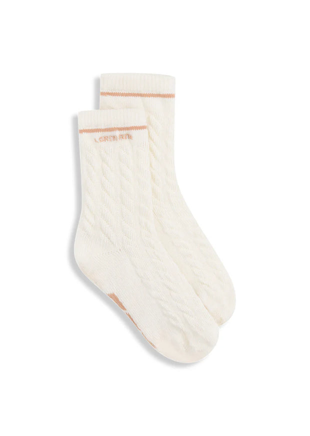 Embrace winter style and comfort in the Cable Knit Crew Socks! Designed to be worn out for the perfect athleisure look, as well as just lounging at home, these crew length socks are crafted from our breathable cotton blend cable knit for all day wear.