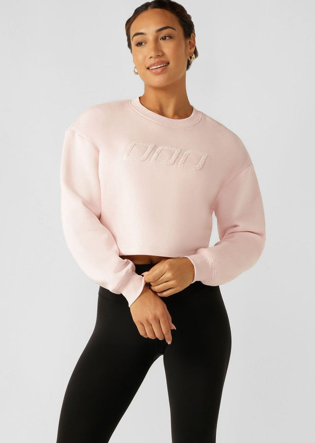 Flattering Cropped Silhouette Iconic Boucle Embroidery Cozy Brushed Fleece Fabric To Keep You Warm Dropped Sleeves for an Effortless Relaxed Fit Ribbed Cuffs