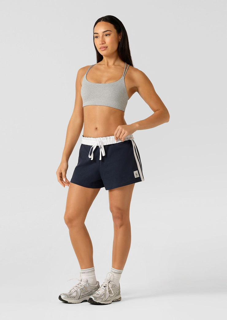 Fan-favourite alert! We're bringing back the beloved Dance Shorts to elevate your athleisure game. Designed for style and comfort, these cotton-jersey shorts feature a fold over waistband with drawcord adjustability, retro-sport inspired contrast striping down the side leg and our limited edition badge. Get it quick, this is a must-have style for summer!