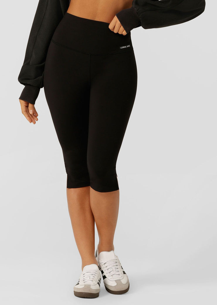 Styling your athleisure look is effortless with these 3/4 leggings. Made from our iconic Nothing 2 See Here fabric for unmatched coverage, these leggings feature a high rise soft fold waistband for added comfort and elevated side split details so you can move with ease, perfect for Pilates, yoga, morning coffee walks, and everything in between.