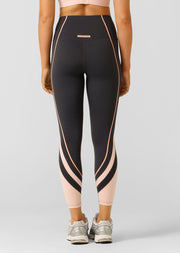Embrace your pace with these supportive ankle biter leggings. Made from our iconic Bare Minimum fabric for the ultimate weightless feeling, these leggings feature drawcord adjustability to keep your waistband in place, sporty contrast panelling that contours your curves and a secret back pocket to stash your essentials. These leggings have you covered no matter the workout.