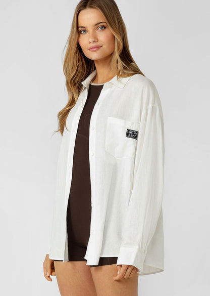 Effortless Relaxed Fit Silhouette with Curved Hem
Button Through Opening and Sleeve Cuffs (+ a Spare)
chest pocket to stash your essentials
Limited Edition Logo Patch