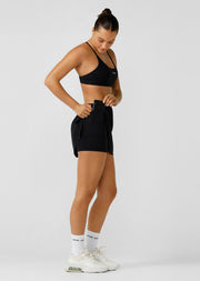 Your New Must-Have Activewear Essential Relaxed Fit Mini Skirt Silhouette Sculpting LJ Elite Shorts Lining with Phone & Ball Pocket Premium Lightweight Active Fabrication LJ Rubber Logo Badge High Rise