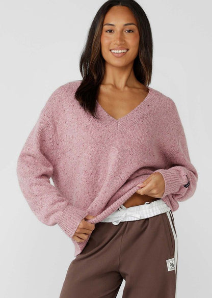 Flattering Relaxed Fit V-Neck Silhouette
Premium True Knit Wool Blend Fabrication in an Elevated Marl Look
Classic Ribbed Cuffs and Hemline