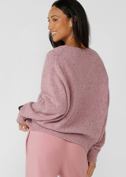 Flattering Relaxed Fit V-Neck Silhouette
Premium True Knit Wool Blend Fabrication in an Elevated Marl Look
Classic Ribbed Cuffs and Hemline