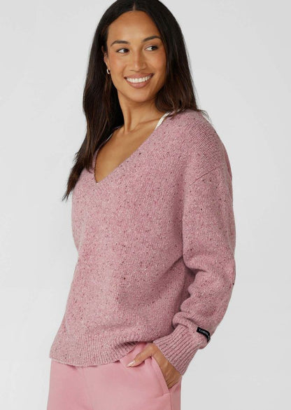 Flattering Relaxed Fit V-Neck Silhouette
Premium True Knit Wool Blend Fabrication in an Elevated Marl Look
Classic Ribbed Cuffs and Hemline