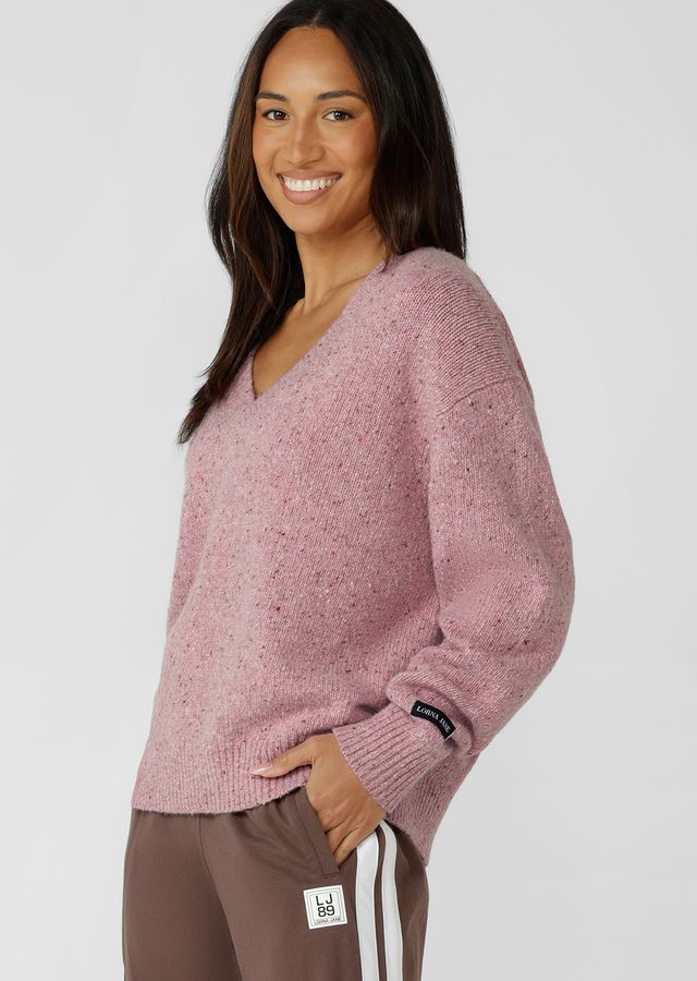 Flattering Relaxed Fit V-Neck Silhouette
Premium True Knit Wool Blend Fabrication in an Elevated Marl Look
Classic Ribbed Cuffs and Hemline