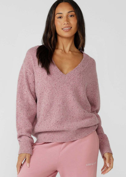 Flattering Relaxed Fit V-Neck Silhouette
Premium True Knit Wool Blend Fabrication in an Elevated Marl Look
Classic Ribbed Cuffs and Hemline