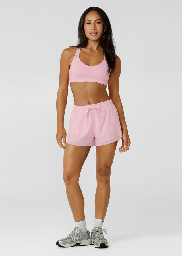 Crafted in sweat wicking Nothing 2 See Here™ fabric, it features a compressive underbust band for high support and a racerback silhouette that clears the shoulder blades for unrestricted movement. Mesh panelling enhances airflow, while the form flattering V shaped neckline balances strength with style.