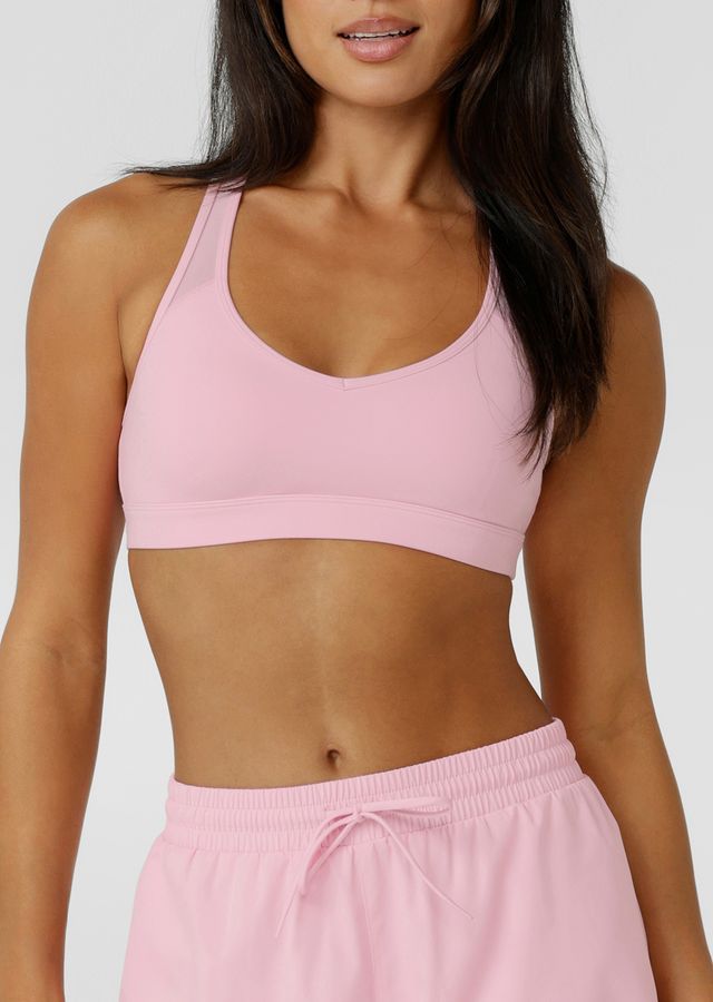 Crafted in sweat wicking Nothing 2 See Here™ fabric, it features a compressive underbust band for high support and a racerback silhouette that clears the shoulder blades for unrestricted movement. Mesh panelling enhances airflow, while the form flattering V shaped neckline balances strength with style.