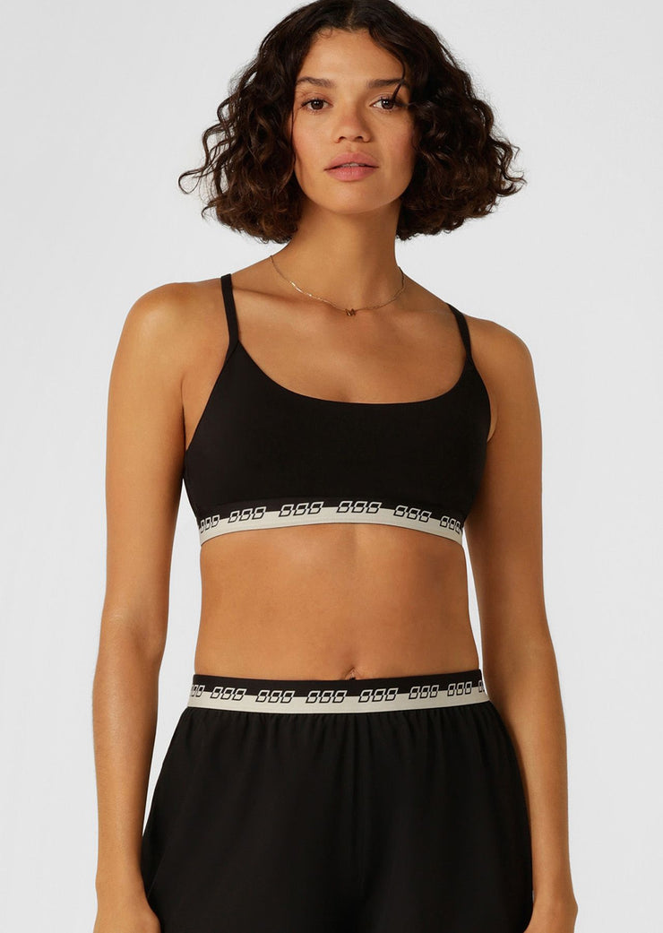 Make a statement in the iconic all day sports bra. Made from our iconic Nothing 2 See Here™ fabric, this style features limited edition iconic elastic across the hem, adjustable shoulder straps and removable padding for shape and support.