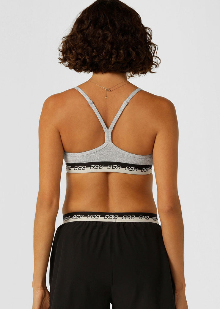 Make a statement in the iconic all day sports bra. Made from our soft & supple True Comfort fabric, this style features limited edition iconic elastic across the hem, adjustable shoulder straps and removable padding for shape and support.