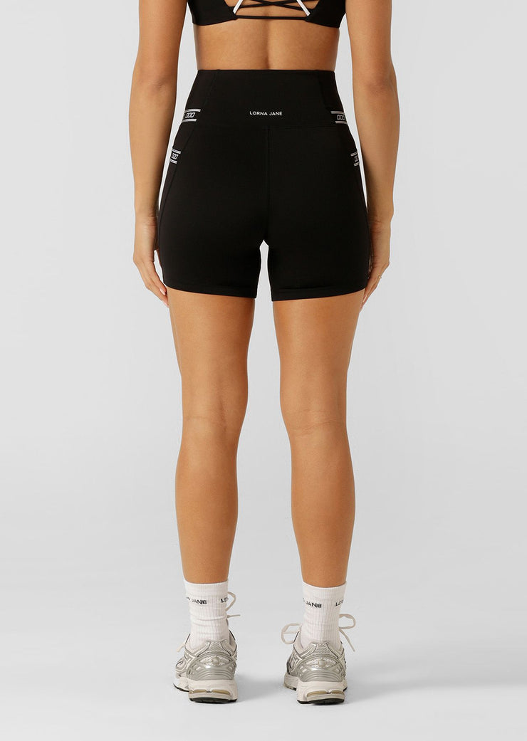 Fan-favourite alert! We’re bringing back these beloved bike shorts to elevate your activewear game. Designed for style and performance, these bike shorts feature Active Core Stability™ and side pockets with our limited edition iconic elastic detailing. Perfect for any workout, we can't wait for you to put these to the test.