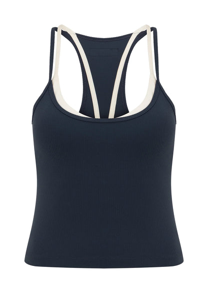 Built In Shelf Bra with Removable Padding for All Day Support
Fashion Forward Layered Look Design
Form Flattering Full Length Fitted Silhouette
Sweat wicking Luxe Active Rib Fabrication
Woven Logo Badge