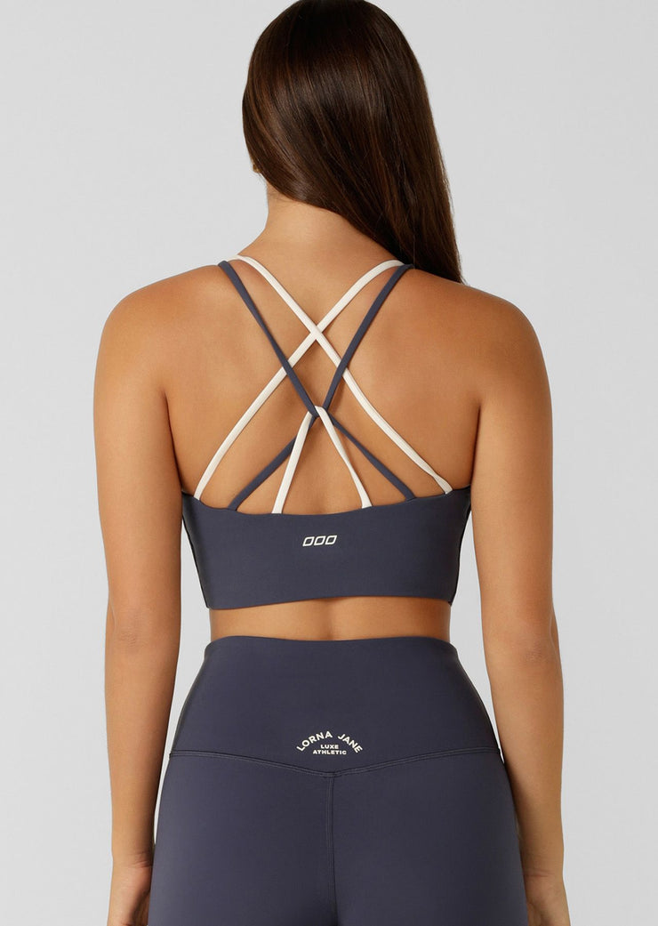 In-Built Bra with Removable Padding for All Day Support Intricate Contrast Strappy Back Design Limited Edition Lotus Printed Logo Flattering V Neckline Soft Fold Longline Hemband for Reduced Dig