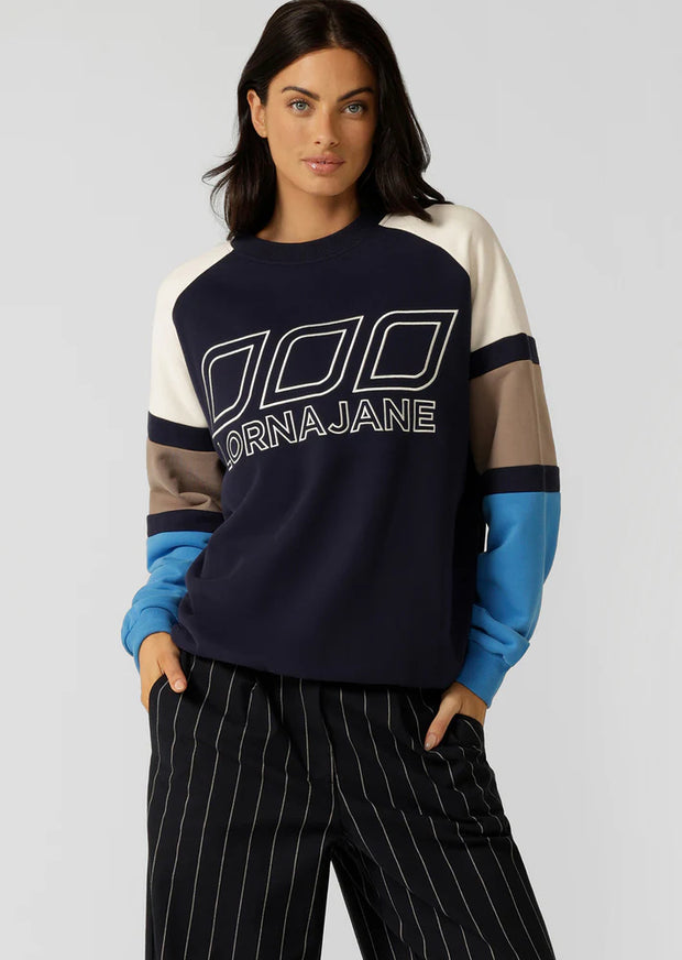 Layer up in this effortlessly cool sweatshirt. Made from our super soft and breathable cotton terry, it's the perfect transitional style you can wear throughout and after winter. Complete with our iconic colour blocking and statement logo embroidery, this is your must-have athleisure styling piece