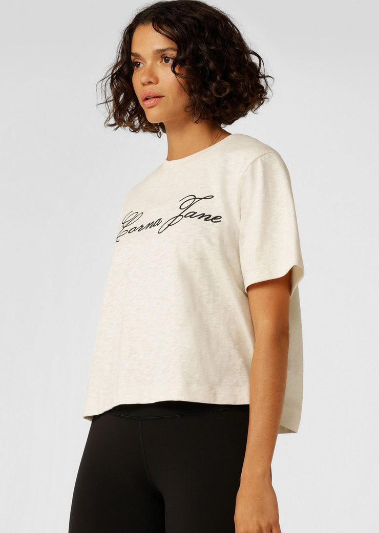 Meet your new versatile wardrobe essential with this slightly cropped and loose-fitting tee. Made from lightweight and breathable premium cotton slub jersey, this flattering tee features elevated limited edition embroidery that can be dressed up or down, making it perfect transitional styling piece to take you from gym to street to office.