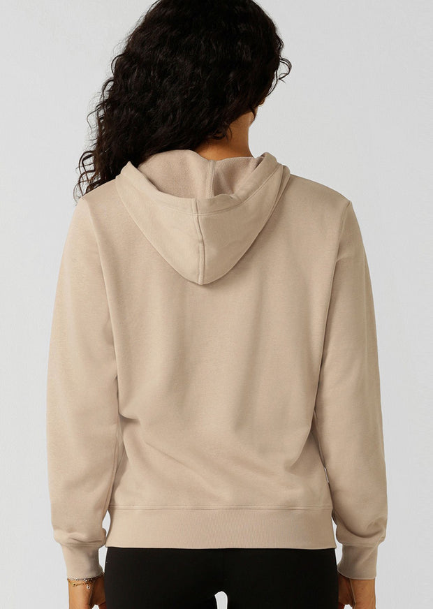 Introducing the Lotus Hoodie - your essential trans-seasonal layering piece! This lightweight relaxed fit jumper is complete with our elevated heritage embroidered logo, a functional drawcord hood and classic ribbed cuffs and hem band.