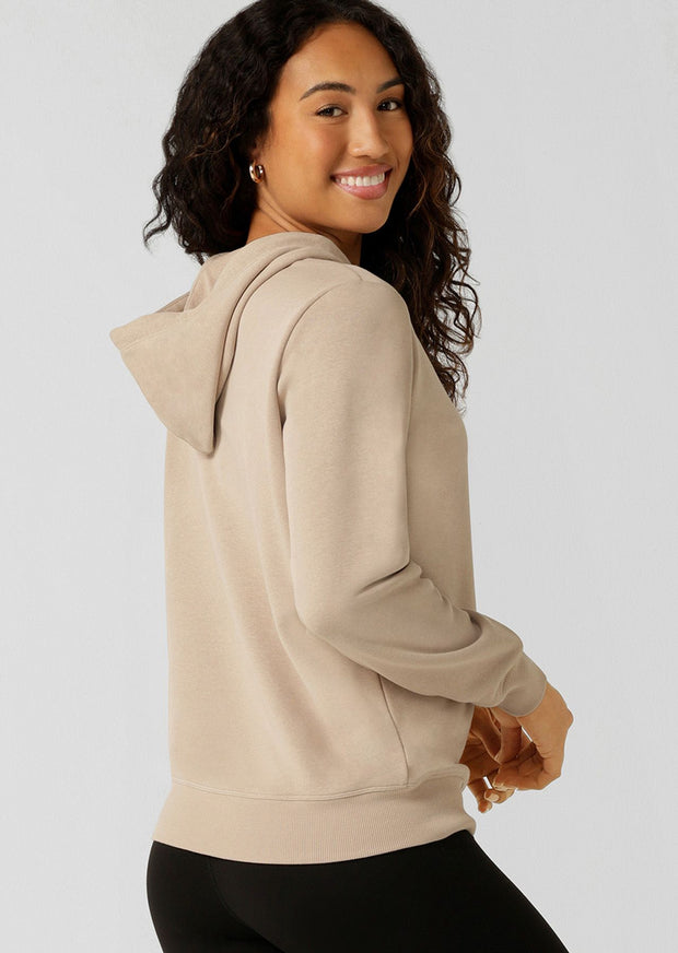 Introducing the Lotus Hoodie - your essential trans-seasonal layering piece! This lightweight relaxed fit jumper is complete with our elevated heritage embroidered logo, a functional drawcord hood and classic ribbed cuffs and hem band.