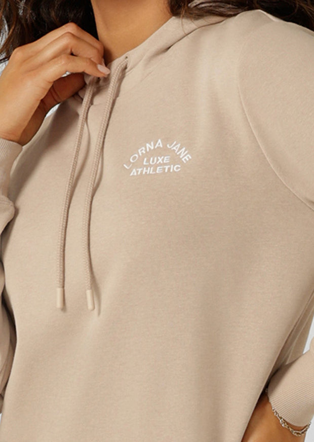 Introducing the Lotus Hoodie - your essential trans-seasonal layering piece! This lightweight relaxed fit jumper is complete with our elevated heritage embroidered logo, a functional drawcord hood and classic ribbed cuffs and hem band.