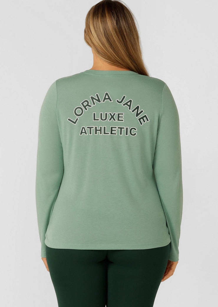 An easy layering piece for cooler weather, the Lotus Long Sleeve Top. This relaxed fit layering piece is made from lightweight and breathable LJ Active fabric, so it stretches with you in and out of the gym