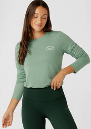 An easy layering piece for cooler weather, the Lotus Long Sleeve Top. This relaxed fit layering piece is made from lightweight and breathable LJ Active fabric, so it stretches with you in and out of the gym