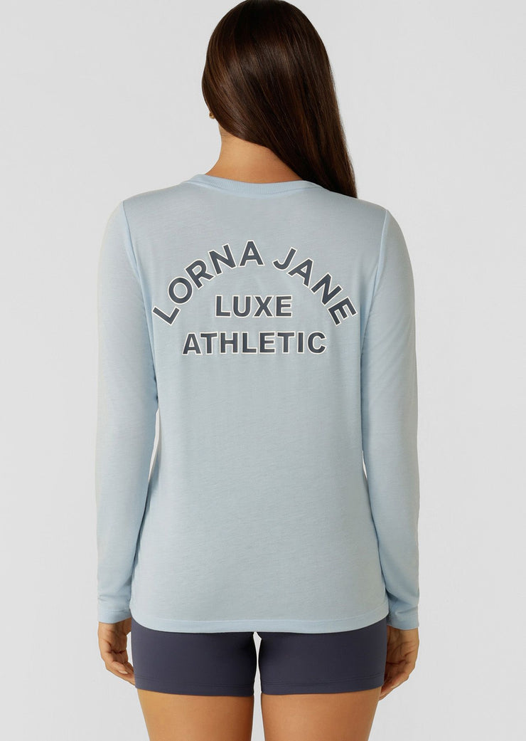 An easy layering piece for cooler weather, the Lotus Long Sleeve Top. This relaxed fit layering piece is made from lightweight and breathable LJ Active fabric, so it stretches with you in and out of the gym.