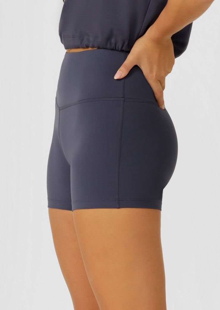 The Lotus Limited Edition No Chafe 12cm Bike Short is designed for the 'IT' girl on the go. Simple, versatile and oh-so fashionable, these shorts are buttery soft and thoughtfully designed for lounging, yoga, beach walks or coffee dates. They are constructed with a hidden key pocket in the front waistband and no internal leg seam for ultimate no chafe comfort. Pair with the Lotus Sports Bra for a matching set look.