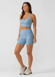 The Lotus Bike Short is designed for the 'IT' girl on the go. Simple, versatile and oh-so fashionable, these shorts are buttery soft and thoughtfully designed for lounging, yoga, beach walks or coffee dates. They are constructed with a hidden key pocket in the front waistband and no internal leg seam for ultimate no chafe comfort. Pair with the Lotus Sports Bra for a matching set look.