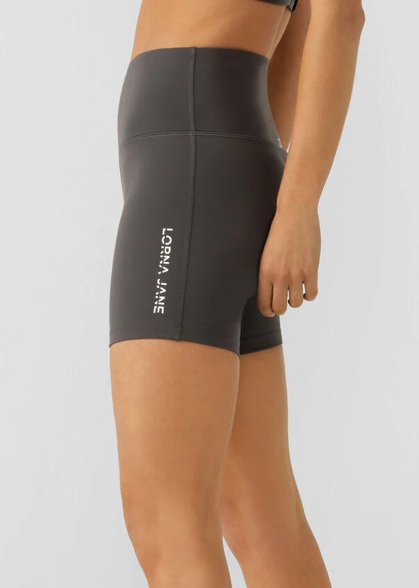 The Lotus Bike Short is designed for the 'IT' girl on the go. Simple, versatile and oh-so fashionable, this short is buttery soft and thoughtfully designed for lounging, yoga, beach walks or coffee dates. They are constructed with a hidden pocket in the waistband and no internal leg seam for ultimate no chafe comfort.