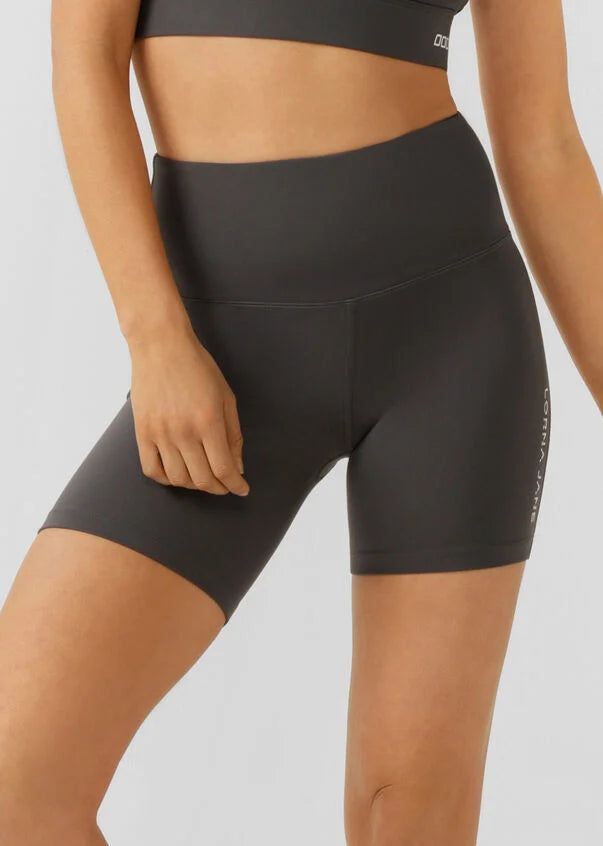 The Lotus Bike Short is designed for the 'IT' girl on the go. Simple, versatile and oh-so fashionable, this short is buttery soft and thoughtfully designed for lounging, yoga, beach walks or coffee dates. They are constructed with a hidden pocket in the waistband and no internal leg seam for ultimate no chafe comfort.
