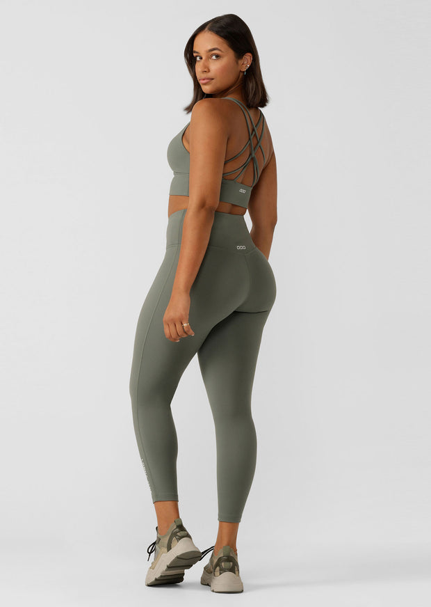 The Lotus Legging is designed for the 'IT' girl on the go. Simple, versatile and oh-so fashionable, this legging is buttery soft and thoughtfully designed for lounging, yoga, beach walks or coffee dates. They are constructed with a hidden pocket in the waistband and no internal leg seam for ultimate no chafe comfort. Pair with the Lotus Sports Bra for a matching set look.