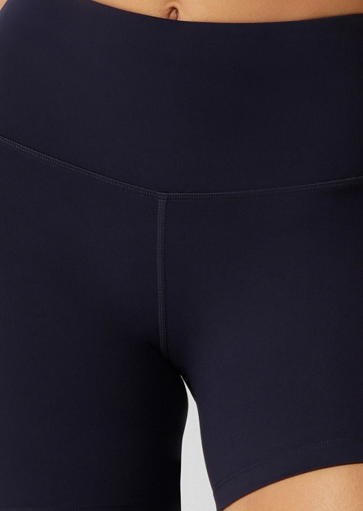 The Lotus 12cm Bike Short is designed for the 'IT' girl on the go. Simple, versatile and oh-so fashionable, these shorts are Lightly Brushed Soft Feel and thoughtfully designed for lounging, yoga, beach walks or coffee dates. They are constructed with a hidden back pocket and no internal leg seam for ultimate no chafe comfort. Pair with the Lotus Sports Bra for a matching set look.