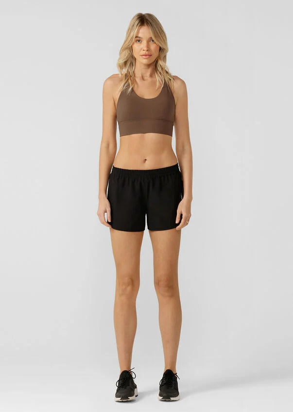 The Lotus Sport Short is designed for the 'IT' girl on the go. Made from a soft and breathable lightweight stretch woven fabric that moves with you, these shorts are perfect for all sports, as well as beach walks and coffee dates.