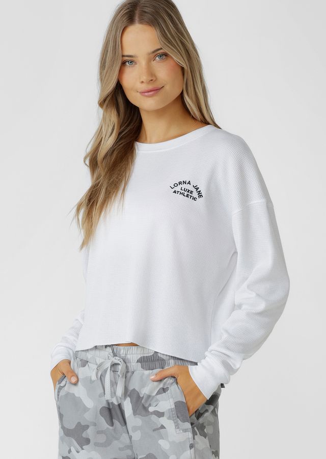 Versatile, Transseasonal Wardrobe Essential
Premium Cotton Blend Waffle Fabrication in our Statement Soft Camo Print
Classic Ribbed Crew Neckline and Sleeve Cuffs
Effortless Slightly Cropped Relaxed Fit Silhouette
Classic Lotus Logo Embroidery