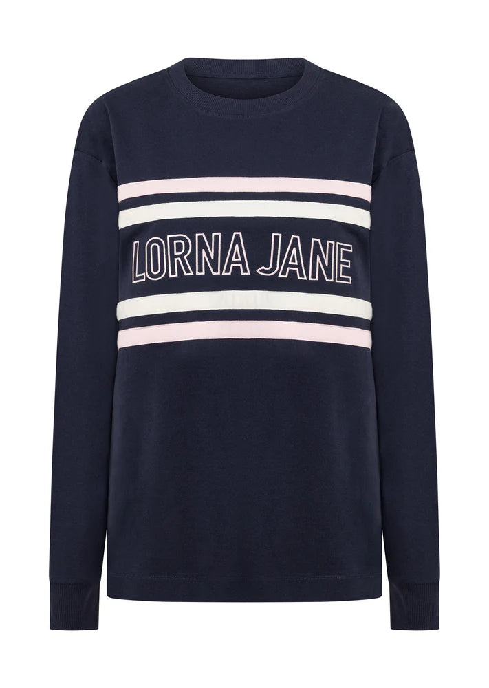 Wear Anywhere Wardrobe Essential
Effortless Relaxed Fit Silhouette
Elevated Embroidered Logo Design
Retro Sport Inspired Contrast Colour Blocked Panels
Classic Rib Crew Neckline and Cuffs