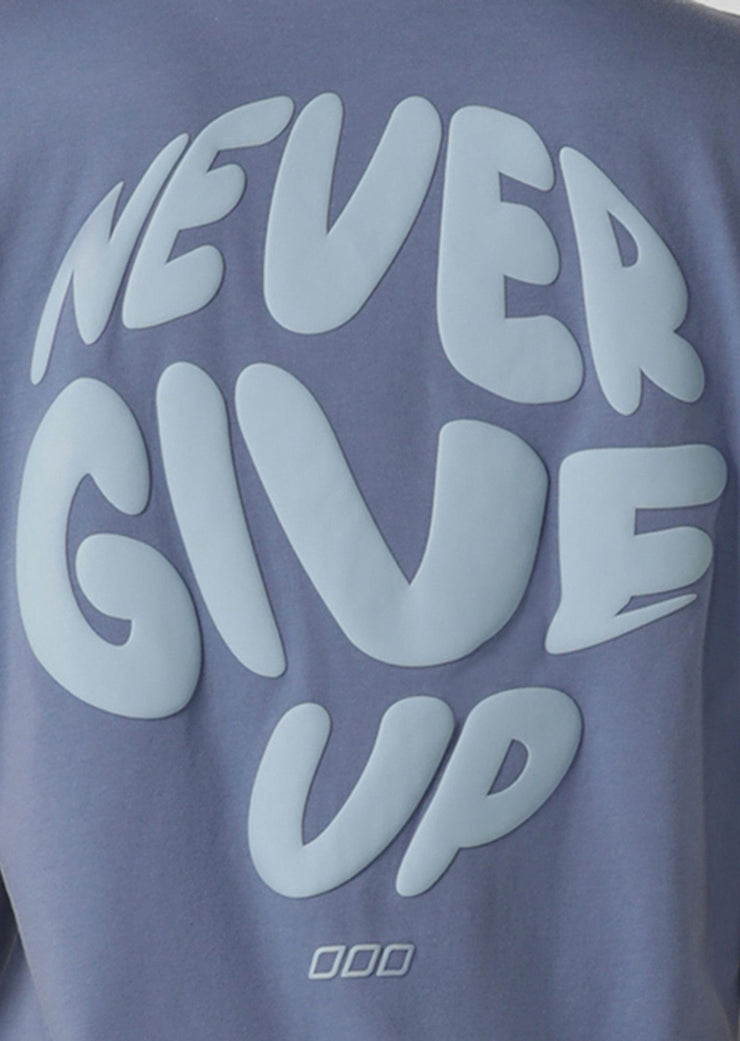 Upgrade your activewear look with the Never Give Up Relaxed Tee. Made from 100% Cotton, this versatile graphic tee is perfect for wearing over your activewear or back with your everyday leisure wardrobe.