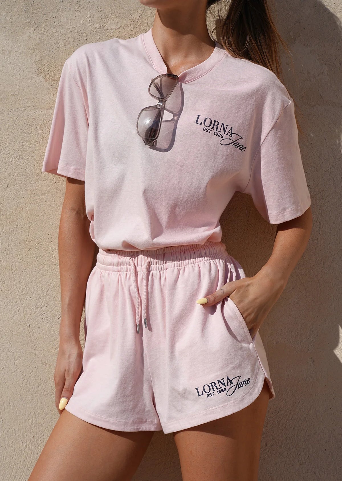 Part of a set
Premium breathable cotton jersey fabrication
Elasticated waistband with drawcord adjustability
Limited edition logo print
Form flattering curved hem
Relaxed fit silhouette
Side pockets to stash your essentials