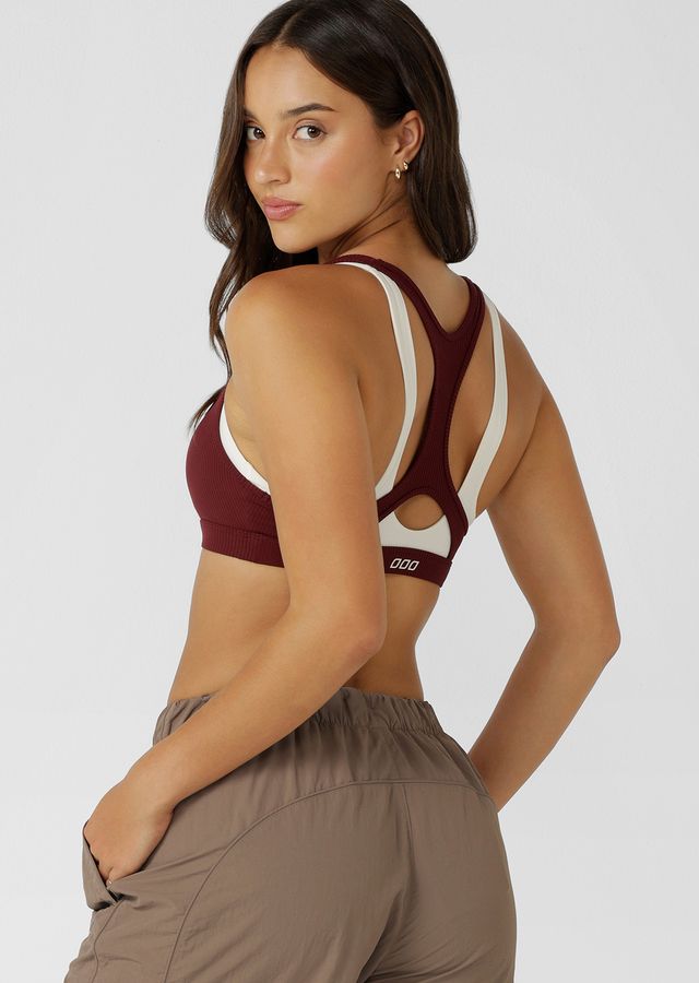 Supportive Multi-Layer Racerback Design Provides All Day Support
Luxe Rib Layered Design
Form Flattering Square Neckline
Iconic Logo