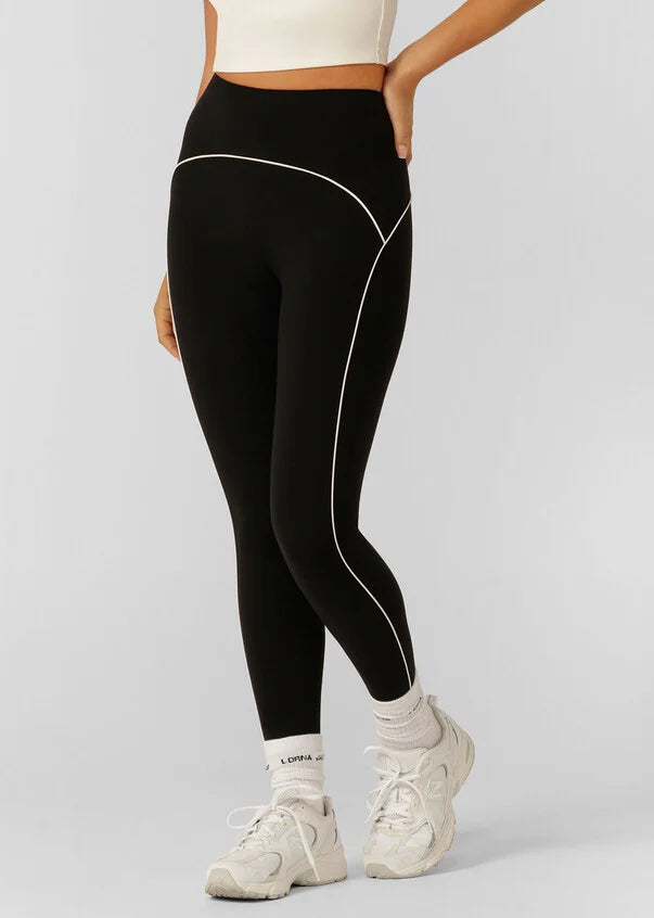 Unlock unlimited styling opportunities in these sleek yet supportive leggings, designed to take your outfit from workout to wherever. Made from our iconic Nothing 2 See Here™ Fabric for unmatched coverage, this full length tight features Active Core Stability for the ultimate streamlined silhouette, a secret phone pocket to stash your essentials and elevated contrast piping to flatter your form. This elevated essential legging is bound to become your new favourite.