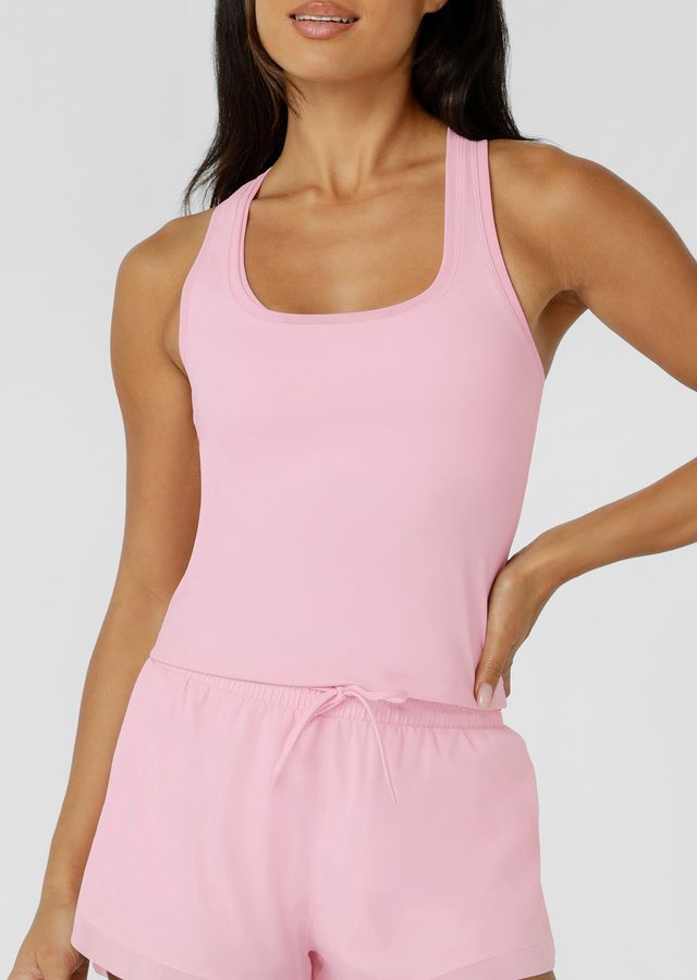 Versatile Active Layering Essential with a Flattering Scoop Square Neckline
Lightweight Mesh Neck &amp; Armhole Bands
Racerback Silhouette That Clears The Shoulder Blades
Sweat Wicking Bare Minimum Active Fabrication for that Barely There Feeling