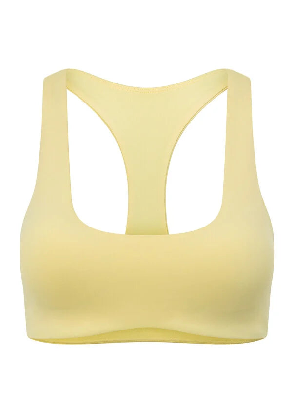 Workout in style in this all-day support sports bra, made from our sweat wicking Nothing 2 See Here™ fabric. Featuring a flattering curved underbust shape and removable padding for added support, this streamlined bra is perfect for all day comfort and low intensity workouts.